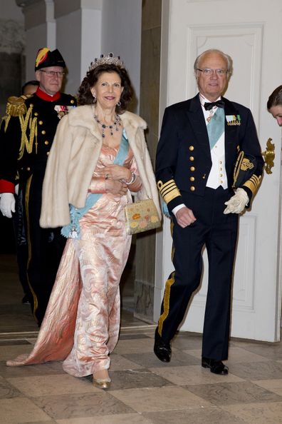 Queen Silvia of Sweden and King Carl Gustaf of Sweden arrive for an event.