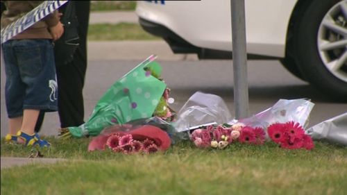 Tributes for the girl are growing near her Aberglasslyn home. (9NEWS)