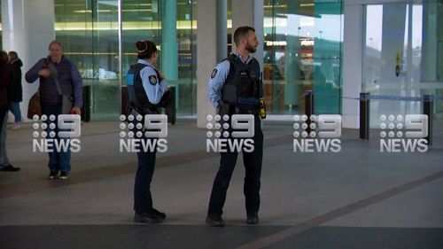 Police at Canberra Airport following a shooting