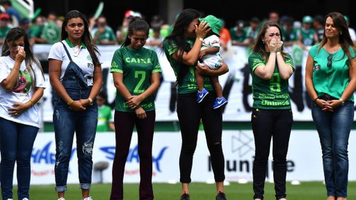Relatives of players who died in the LaMia airplane crash in Colombia attended the game at the Arena Conda stadium. (AFP)