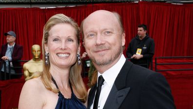 Screenwriter Paul Haggis, right, nominated for best original screenplay for his work on "Letters from Iwo Jima", arrives with his wife Deborah Rennard, for the 79th Academy Awards on February 25, 2007. (AAP)