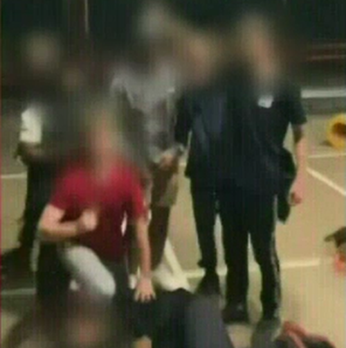 Boys from top Brisbane high schools have filmed themselves re-enacting the murder of Black man George Floyd.