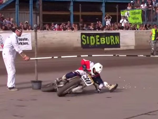 Dirt biker does the limbo