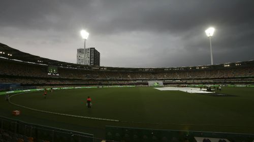 Play was suspended at the Gabba as the storm moved in. (AAP)