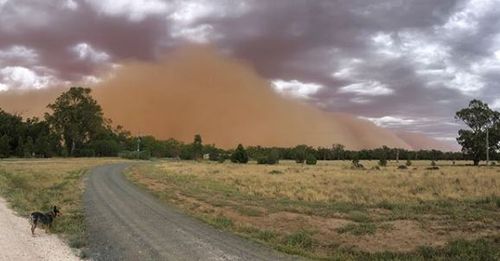 The dust appeared eerily and swallowed whole towns as it swept through this afternoon.