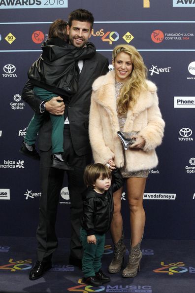 Gerard Pique and Shakira with their sons Milan Pique (L) and Sasha Pique in 2016