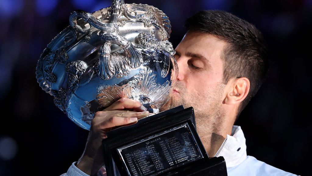 MELBOURNE, AUSTRALIA - JANUARY 29: Novak Djokovic of Serbia poses with the Norman Brookes Challenge Cup after winning the Men&#x27;s Singles Final match against Stefanos Tsitsipas of Greece during day 14 of the 2023 Australian Open at Melbourne Park on January 29, 2023 in Melbourne, Australia. (Photo by Cameron Spencer/Getty Images)