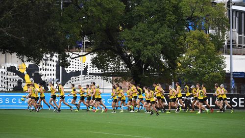 Richmond football players are seen during a Richmond Tigers training session at Punt Road Oval in Richmond, Melbourne. (AAP)