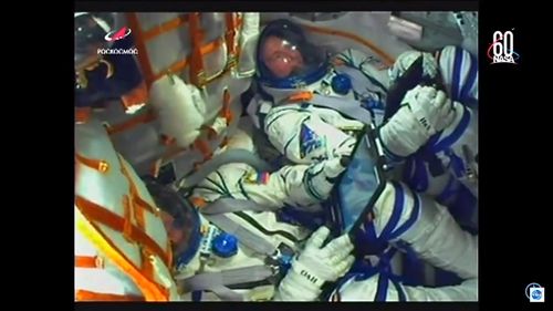 Hague and Ovchin pictured in the Soyuz ready for launch.
