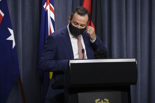 PERTH, AUSTRALIA - JANUARY 31: Premier Mark McGowan arrives wearing a mandatory face mask to Dumas House Press Room on January 31, 2021 in Perth, Australia. Premier Mark McGowan has announced a five day lockdown across the Perth, Peel and South West regions of Western Australia, effective from 6pm local time on Sunday 21 January. The lockdown measures come following the discovery of a positive COVID-19 case in a worker at a quarantine hotel. (Photo by Matt Jelonek/Getty Images)