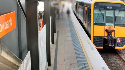 People caught riding on the back of NSW trains.