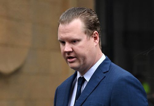 Kristian White arrives at the NSW Supreme Court in Sydney. White a police officer who fatally discharged a taser is accused of killing ninety five year old Clare Nowland in  an aged care facility in Cooma in 2023. Sydney, NSW. November 14, 2024. Photo: Kate Geraghty