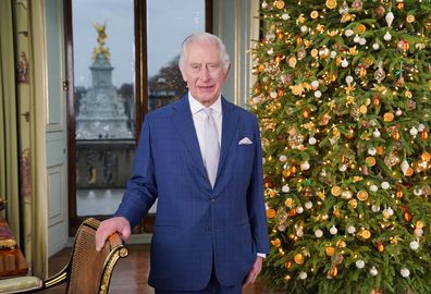 King Charles III during the recording of his Christmas message at Buckingham Palace, London.