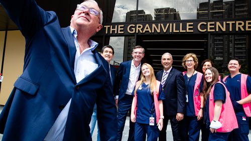NSW Health Minister Brad Hazzard takes a selfie at Granville Centre vaccination clinic in Sydney.