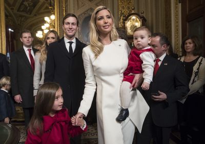 Ivanka Trump cut a chic figure in a white pantsuit by Oscar de la Renta for the swearing in ceremony. She dressed her adorable children in rich burgundy.&nbsp;