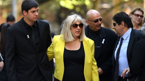 Daniel Kontozis, the son of Tina Kontozis and Stephen Boyd, arrives with family and supporters at the NSW Supreme Court in Sydney (AAP)