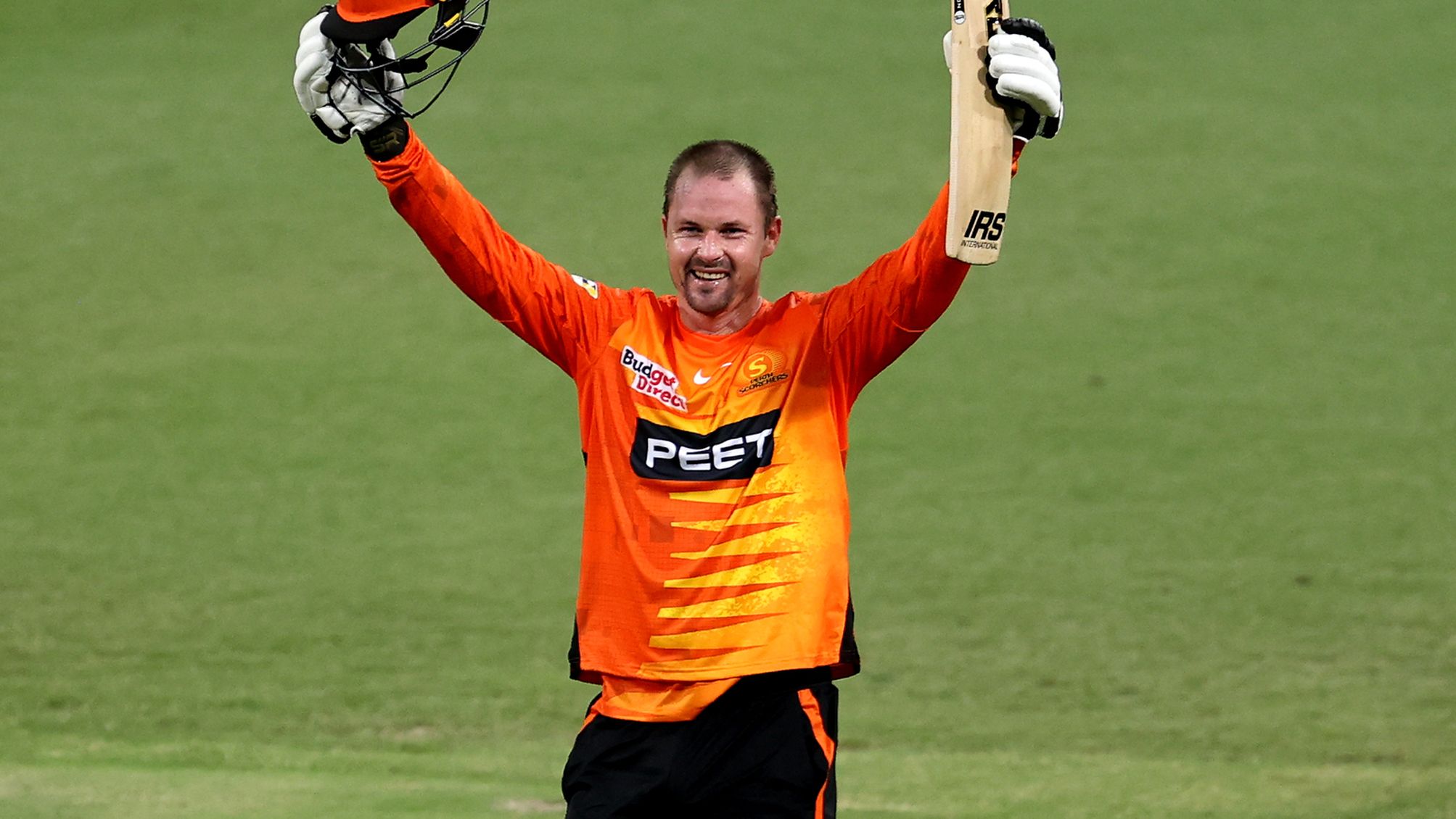 The Scorchers&#x27; Colin Munro celebrates scoring his maiden BBL century.