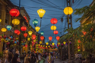 Bright Lanterns hanging over the walking street, in the ancient of Hoi An.