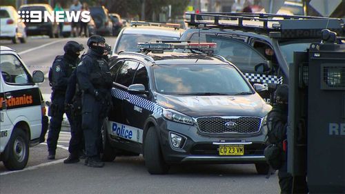 Police outside the property in Punchbowl.