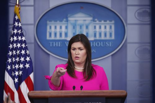 White House press secretary Sarah Huckabee Sanders points to a reporter to take a question as she speaks during the daily press briefing at the White House, Monday, July 23, 2018, in Washington. (AP Photo/Alex Brandon)
