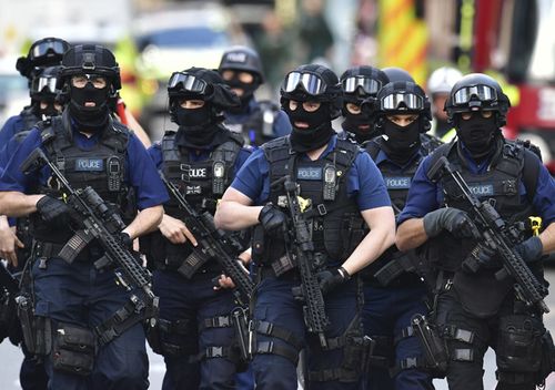 Armed police on St Thomas Street, London, on June 4, 2017, near the scene of Saturday night's terrorist incident on London Bridge and at Borough Market.