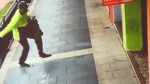 The alleged gunman was captured on CCTV leaving the scene. (9NEWS)