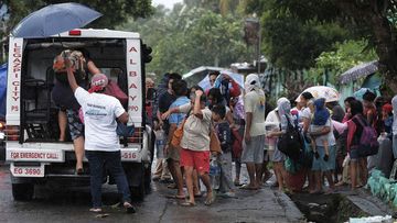 Authorities raised the tropical cyclone warning level for 35 provinces and told people in areas in the path of the category three typhoon to be on alert.