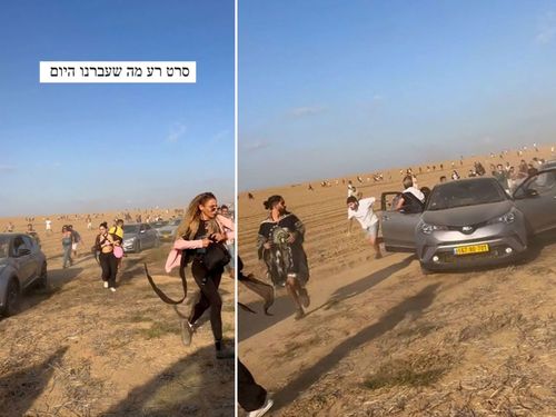 Festivalgoers flee across an empty field, trying to escape Hamas militants who invaded at a music festival near the Gaza-Israel border.