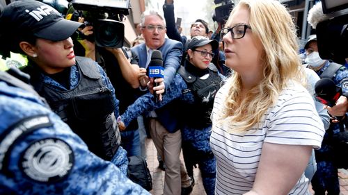 Cassie Sainsbury is escorted into court to await her hearing. (AAP)