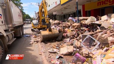 Lismore residents plead for help after floods turn town into 'war zone'.