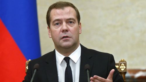 Russian Premier Dmitry Medvedev announces sanctions at the Cabinet meeting in Moscow. (AP Photo/RIA Novosti, Dmitry Astakhov, Government Press Service)