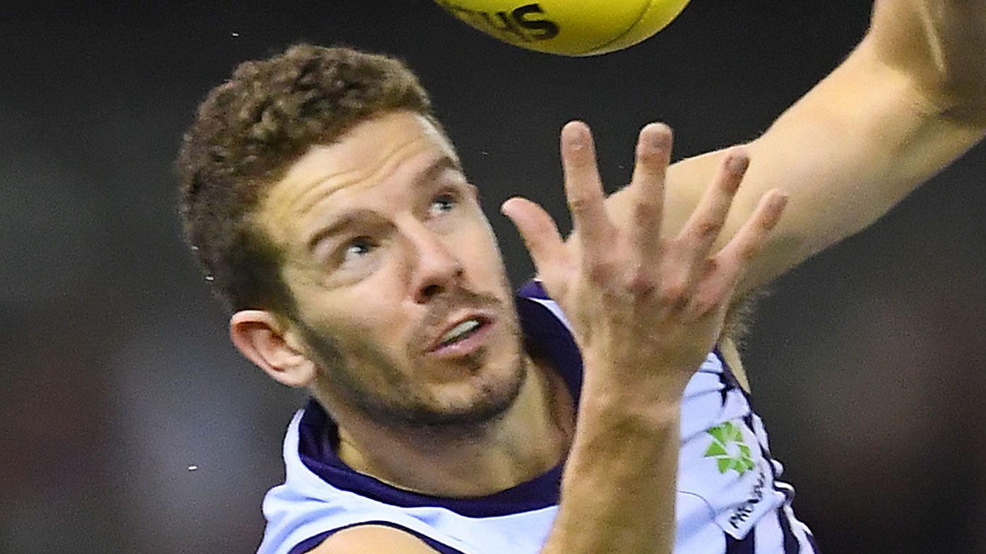 Fremantle Dockers player awaiting test results for coronavirus named in reports
