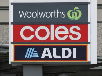 Generic photo of signage of supermarkets Woolworths, Coles and Aldi, seen in Ashfield, NSW, on Tuesday 8 April 2025. Photo: Alex Ellinghausen