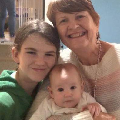 Patricia Curnow with two of her six grandchildren.