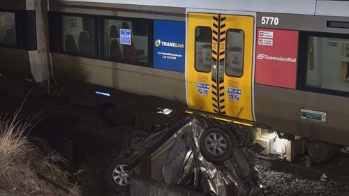 Woman's miraculous escape from car in path of a train
