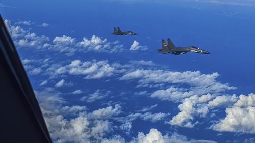 FILE - In this photo released by Xinhua News Agency, fighter jets of the Eastern Theater Command of the Chinese People's Liberation Army (PLA) conduct a joint combat training exercises around the Taiwan Island on Aug. 7, 2022. China blasted an annual U.S. defense spending bill for hyping up the China threat" while Taiwan welcomed the legislation, saying it demonstrated U.S. support for the self-governing island that China says must come under its rule. China deplores and firmly opposes this U.S.