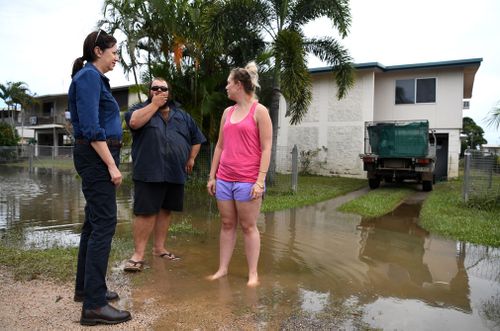 Queensland Premier Annastacia Palaszczuk meets Brittany Somers and Damian Copley outside their flood-affected house in Ingham. (AAP)