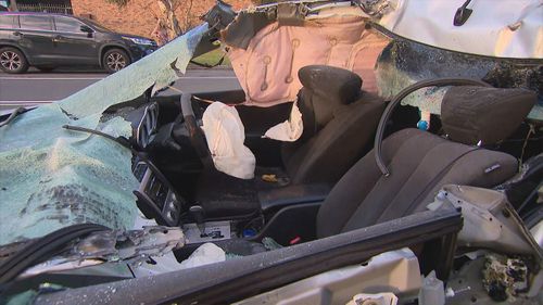 Alleged disqualified driver crashes into semi-trailer in Wetherill Park, Sydney.