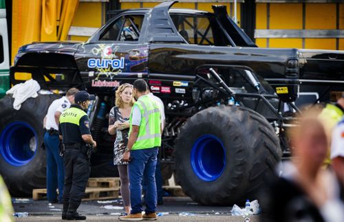 Dutch investigators inspect the site of the accident. (Getty Images)