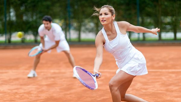 Playing tennis