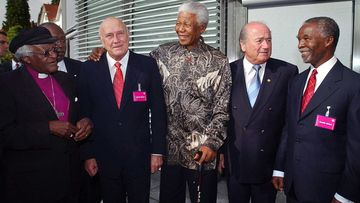 South Africa delegates in May 2004, including Nelson Mandela (centre) and FIFA President Sepp Blatter (second from right). Multiple FIFA executives are facing allegations they accepted huge bribes in order to grant the 2010 World Cup to the African nation. (AAP)