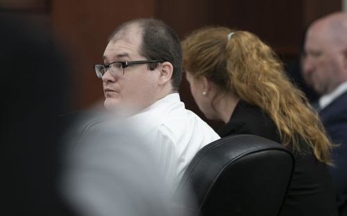 Timothy Jones Jr. looks around the courtroom during closing arguments of his trial in Lexington, S.C. on Thursday, June 13, 2019.  (Tracy Glantz/The State via AP, Pool)/