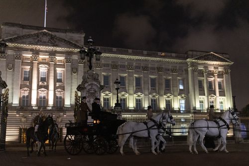 A night time rehearsal for the coronation of King Charles III processes from Buckingham Palace on April 18, 2023 in London, England.  