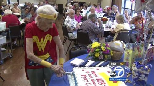 US volunteer celebrates 103rd birthday with just another day on the job as Wonder Woman