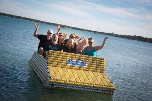 "HMAS Screw Loose" is made of 4,700 cans and can hold eight people. All in the name of fun at the regatta. Picture: Facebook