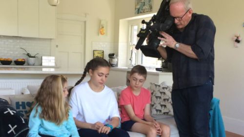 The 9NEWS camera captured siblings Lara, Sylvie and Carter with the Spacetalk safety smartwatch.