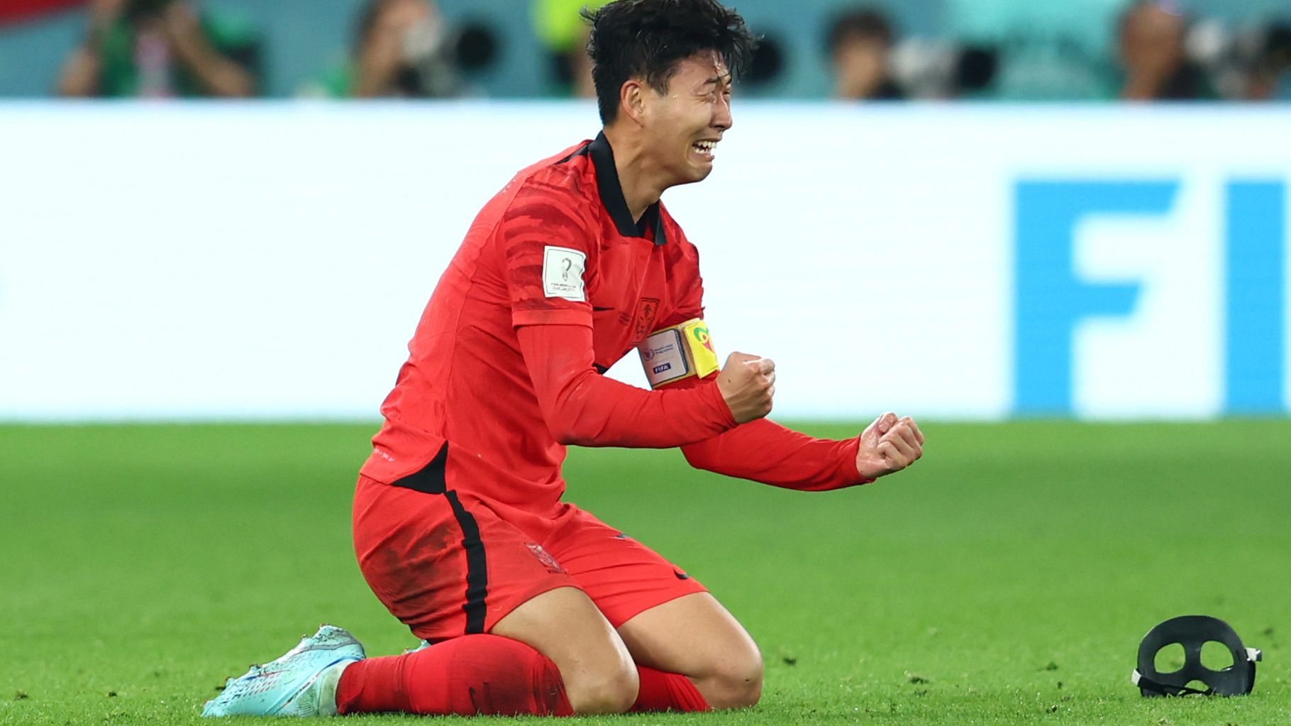 Heung-min Son of Korea Republic reacts at the end of the FIFA World Cup Qatar 2022 Group H match between Korea Republic and Portugal at Education City Stadium on December 2, 2022 in Al Rayyan, Qatar. (Photo by Chris Brunskill/Fantasista/Getty Images)
