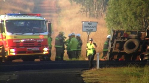 Driver dies after car crushed underneath truck in horrific crash at Peak Crossing in Queensland