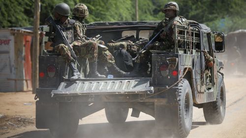 Soldiers deploy to Garissa University in Garissa, Kenya, after gunmen attacked it. (AAP)