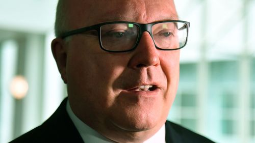 George Brandis won't be "tricked" into expanding same-sex marriage debate  (AAP Image/Mick Tsikas).